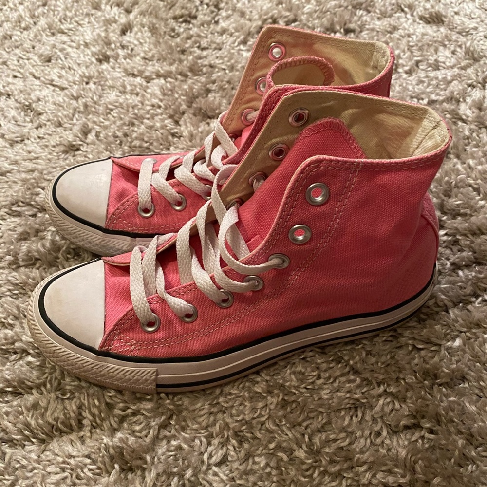 Pink Converse high top Chuck Taylor’s